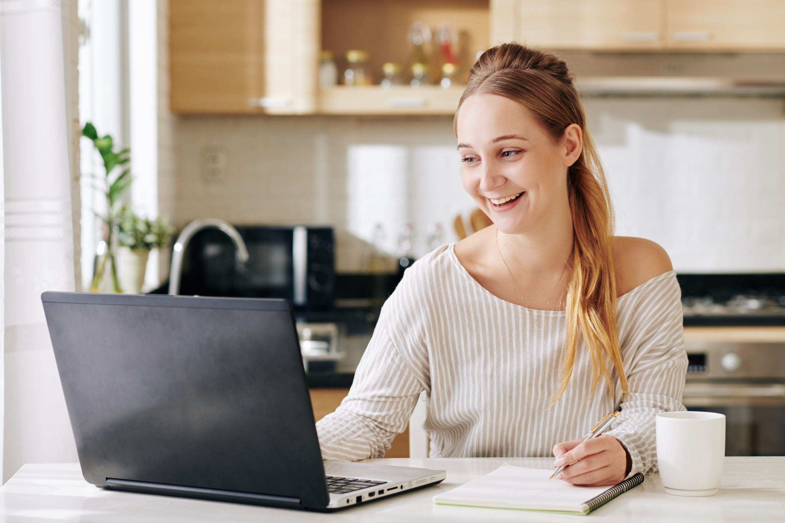 Woman watching webinar online